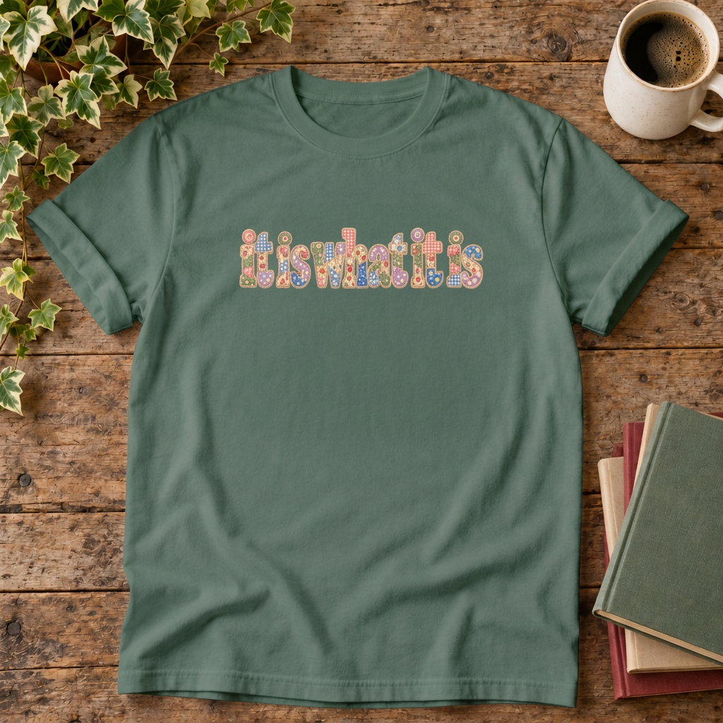 It is what it is colourful t-shirt in Blue Spruce, rustic flat lay