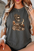 Close-up of blonde woman wearing the Pepper mystical skeleton t-shirt