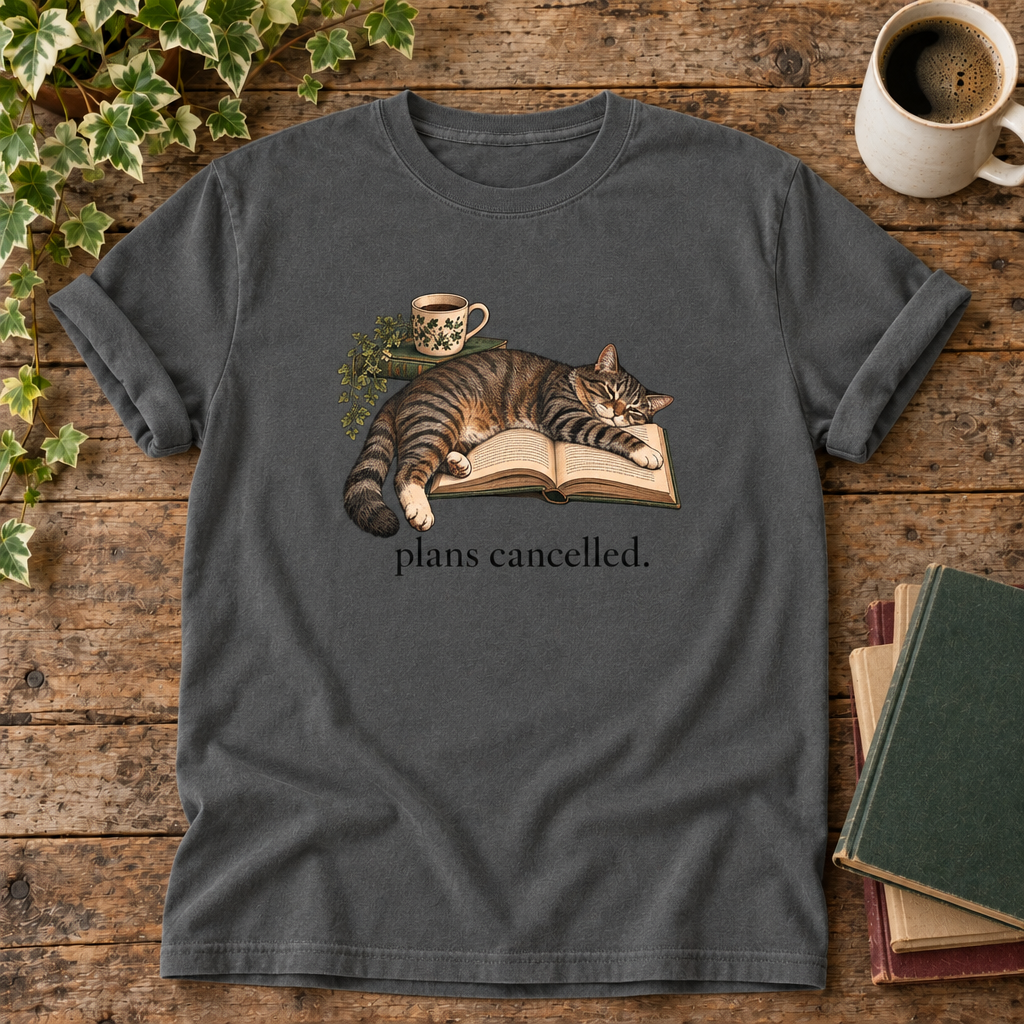 Plans cancelled. Pepper cat and book t-shirt flat lay