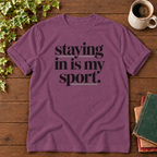 Staying in is my sport Berry, folded sleeve flat lay with smooth timber, mug and books