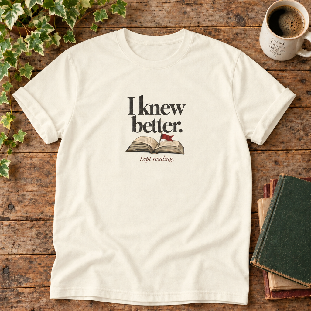 I knew better. Kept reading. Ivory book lover t-shirt flat lay
