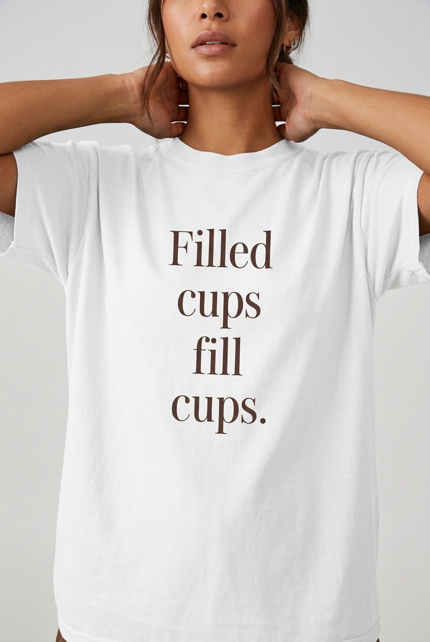 White Filled cups fill cups. T-shirt close-up lifestyle