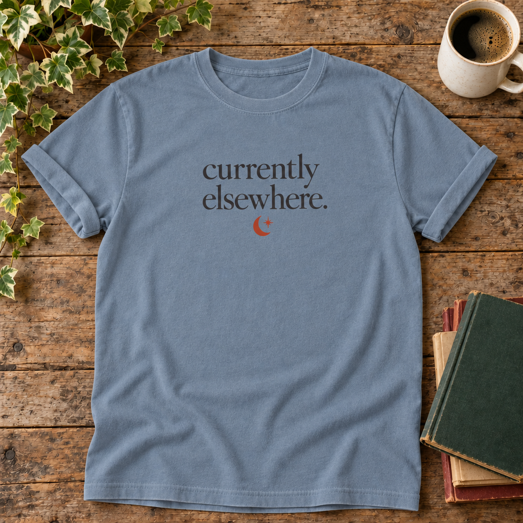 Currently elsewhere. Blue Jean t-shirt flat lay