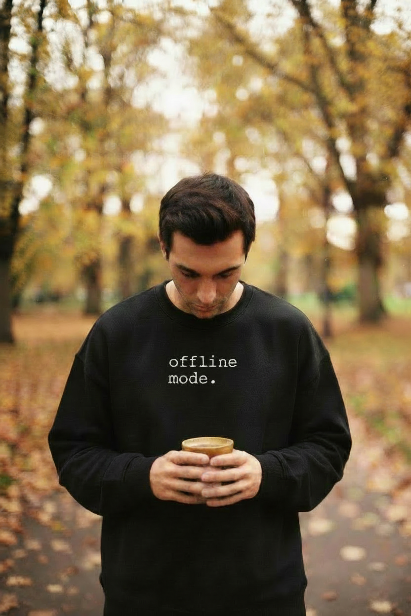 Offline Mode sweatshirt hero - man holding mug in autumn park