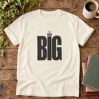 Think Big Ivory T-shirt wood-and-books flat lay