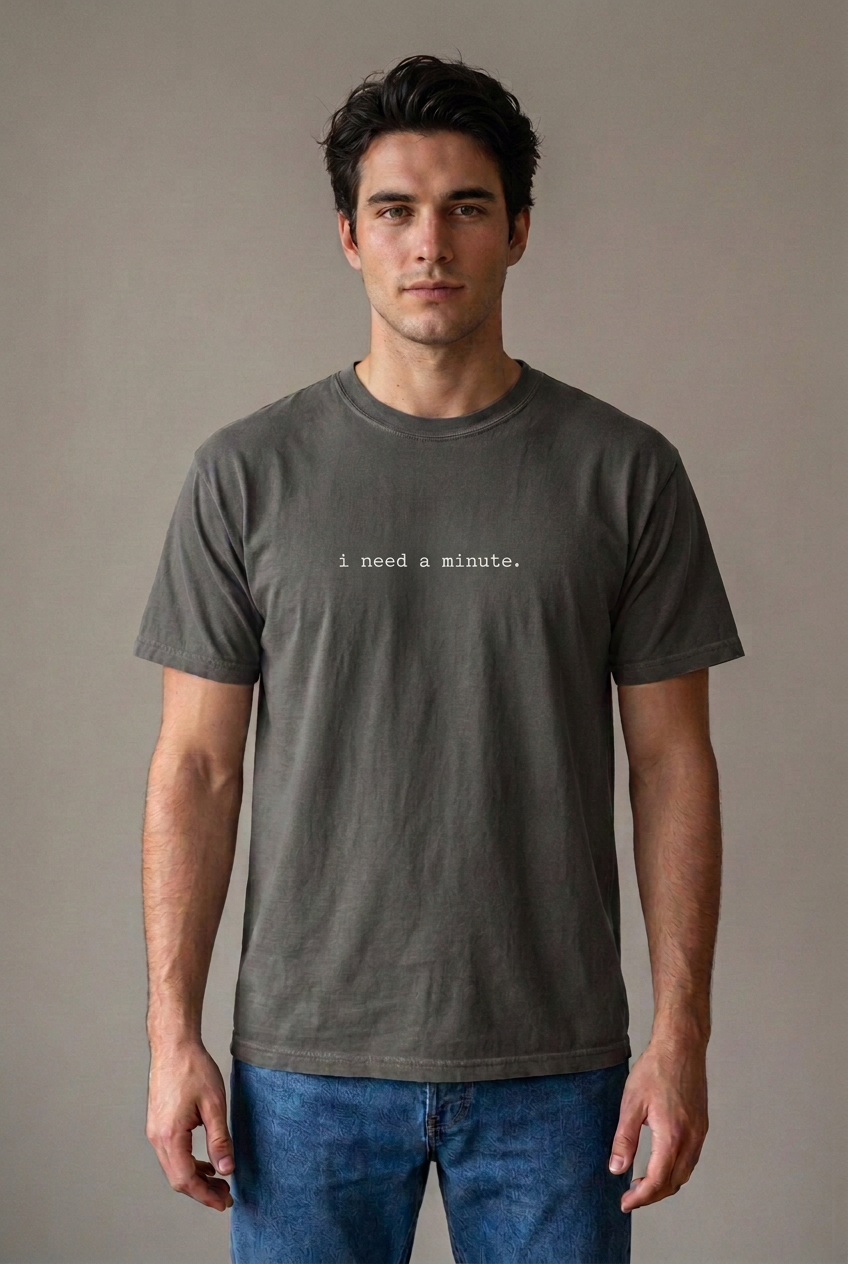 Man wearing i need a minute. Pepper t-shirt