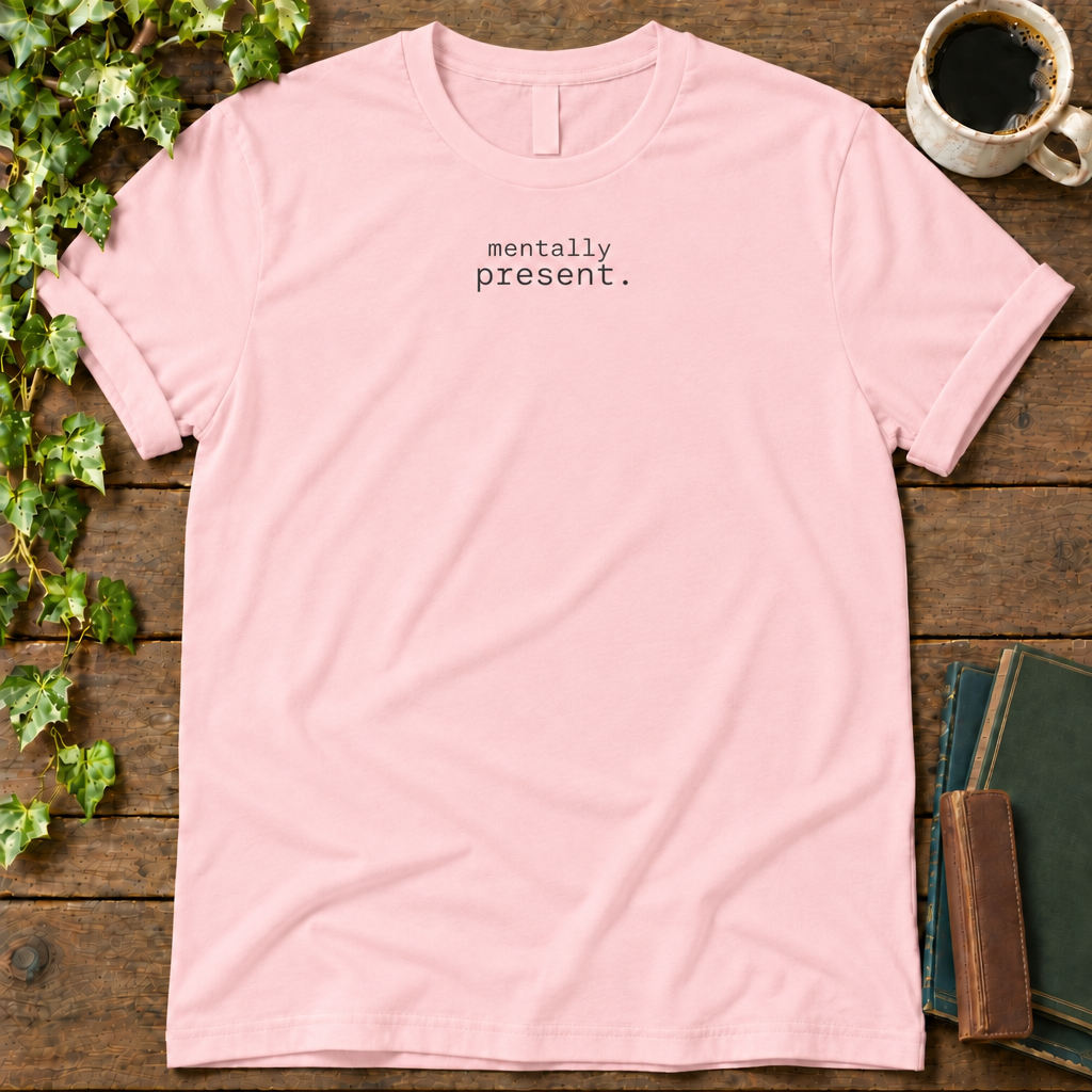 mentally present. pink t-shirt flat lay