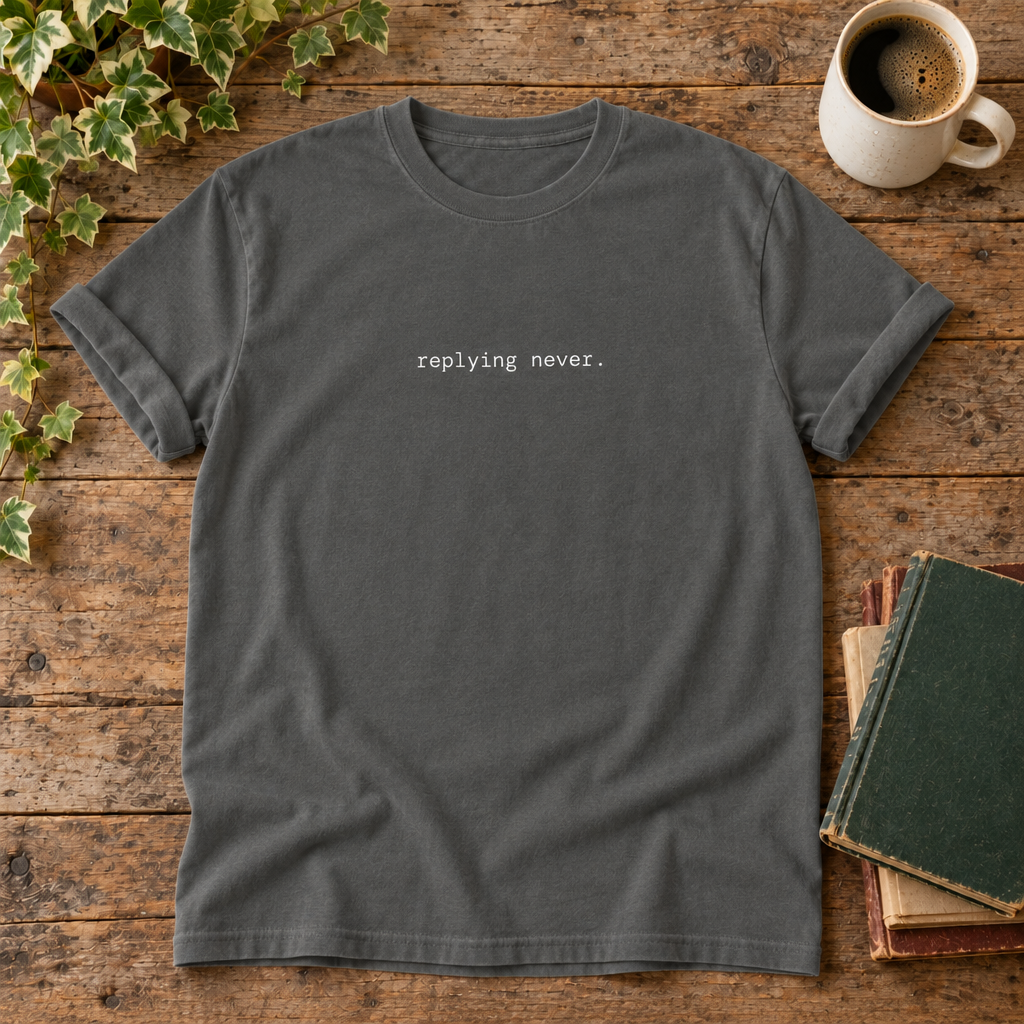 Replying never. Pepper t-shirt weathered-wood flat lay