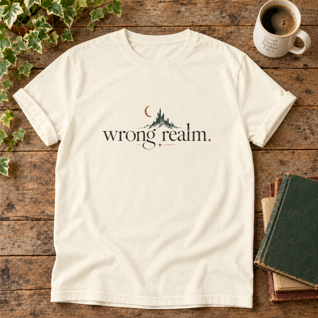 Wrong realm. Ivory t-shirt castle and crescent moon flat lay