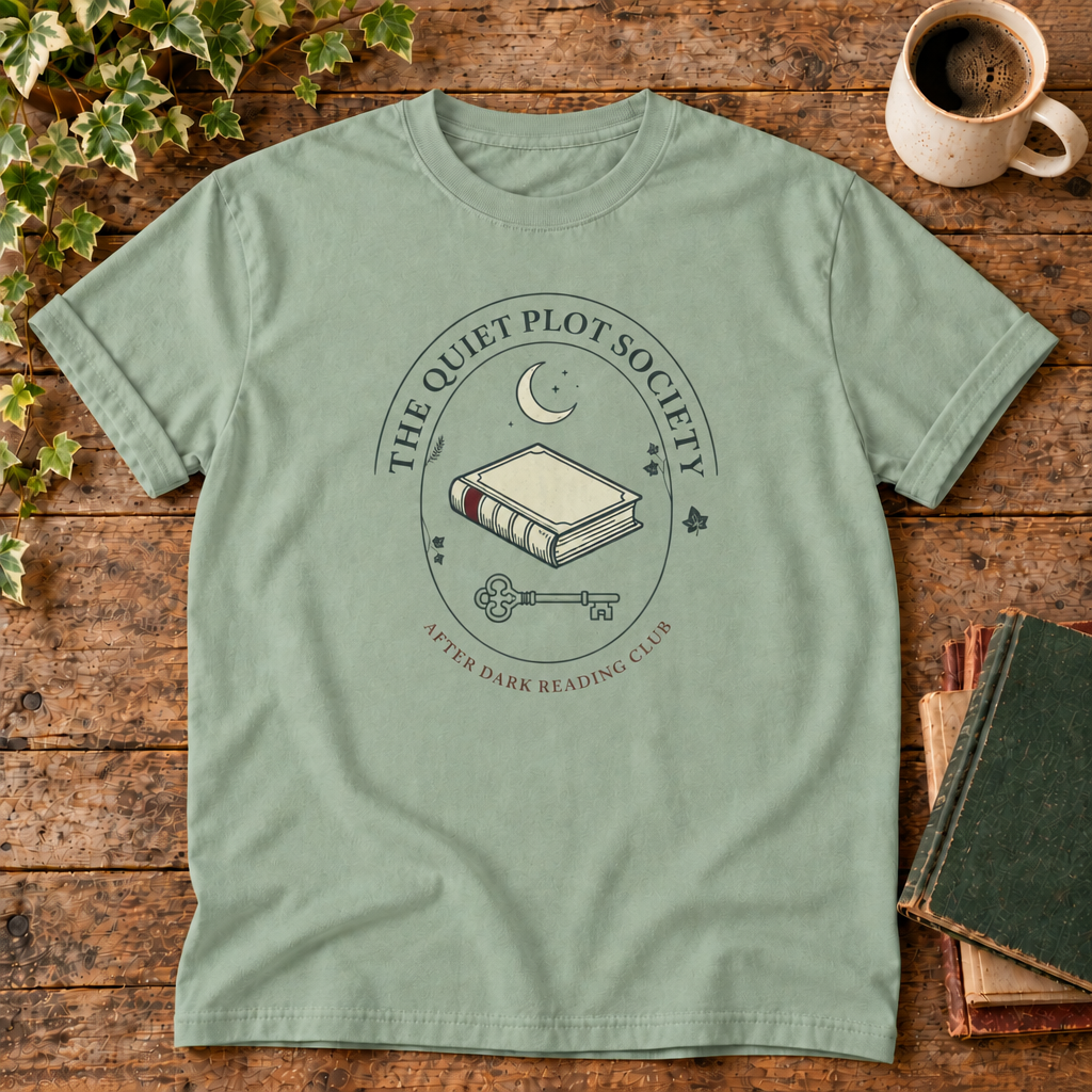 The Quiet Plot Society tee in Bay, flat lay with book and coffee