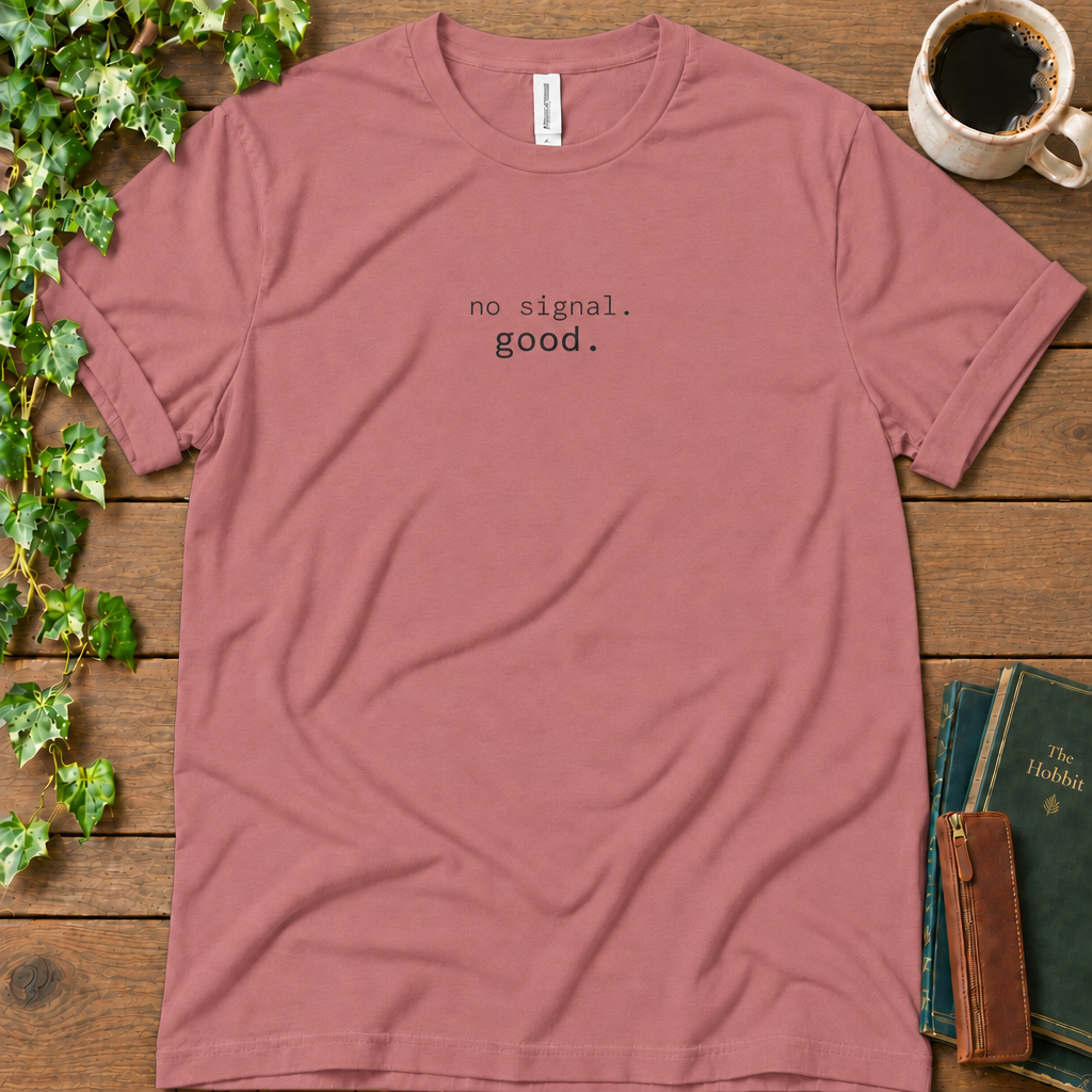 Mauve dusty rose regular-fit tee printed with no signal. good., flat lay on rustic wood with ivy, coffee and vintage books