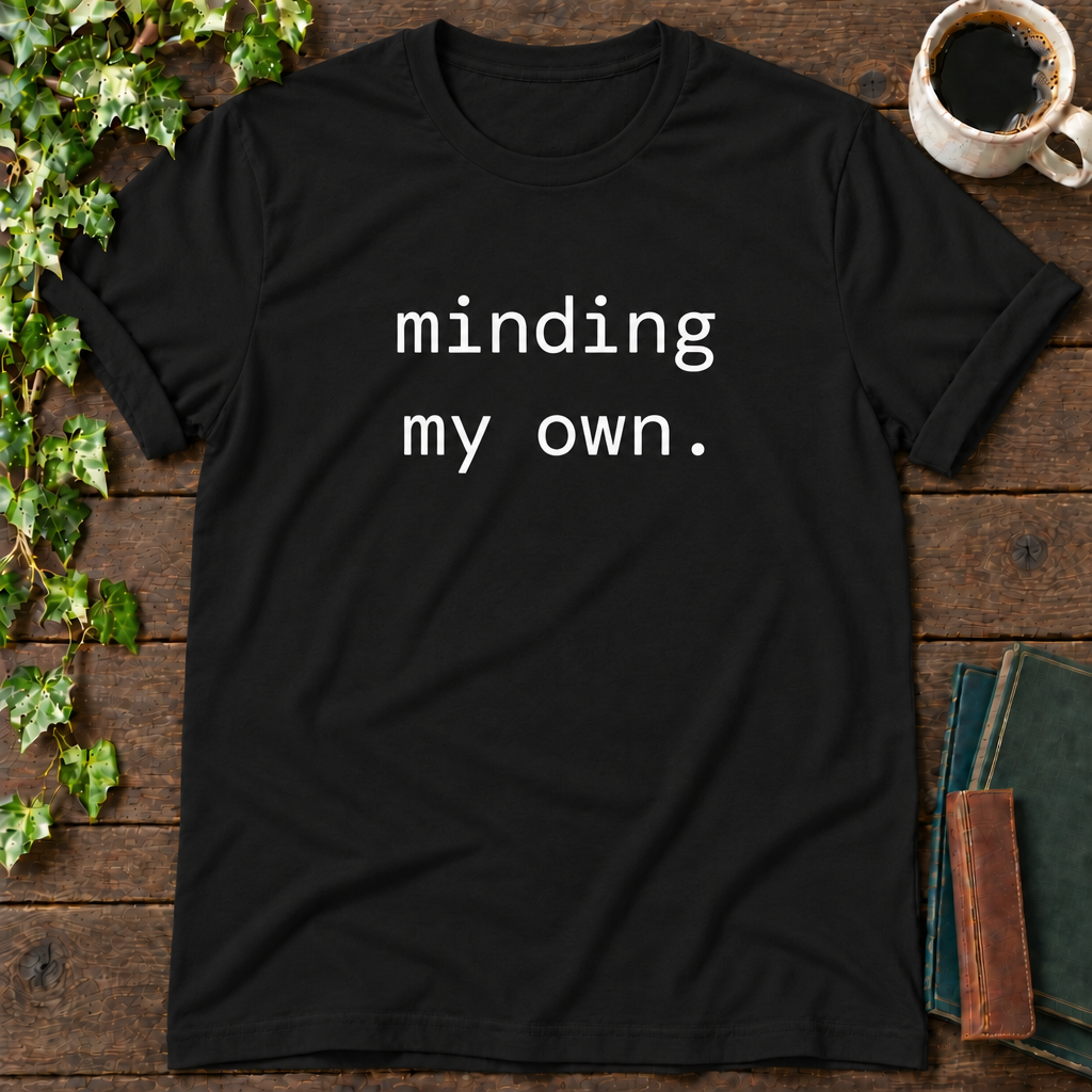 minding my own. black t-shirt flat lay