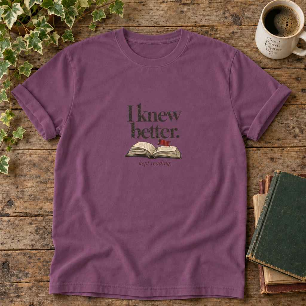 I knew better. Kept reading. Berry book lover t-shirt flat lay