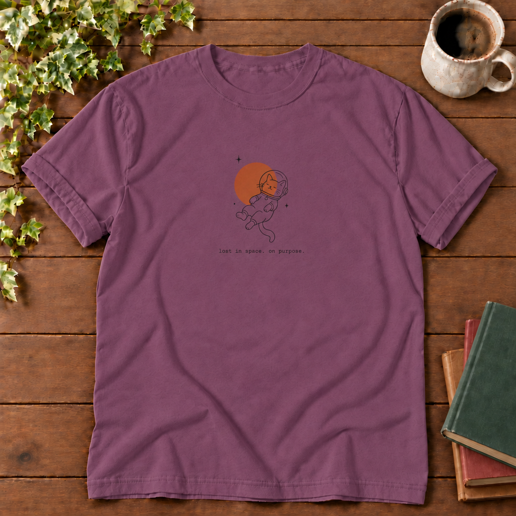 Astronaut cat Berry, lost in space on purpose, smooth wood flat lay