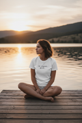 no signal. good. — sitting on jetty, calm lake, white Bella Canvas