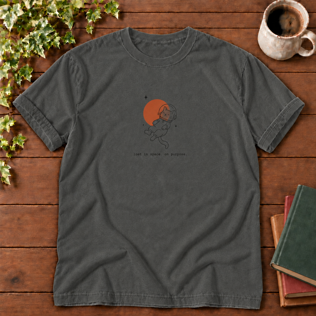 Astronaut cat Pepper, lost in space on purpose, smooth wood flat lay