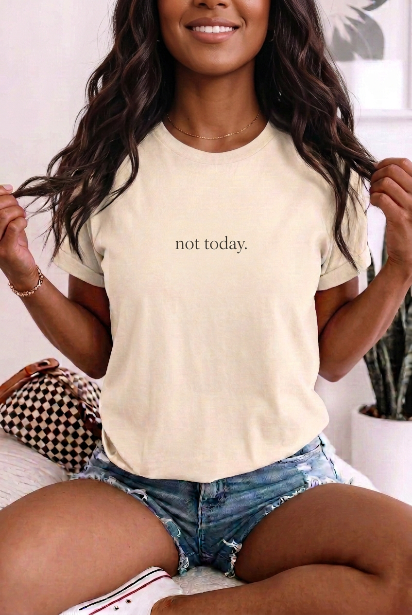 Brown-skinned woman wearing not today. Ivory t-shirt
