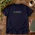 My boundaries T-shirt in darker True Navy with white lettering, stylised flat lay