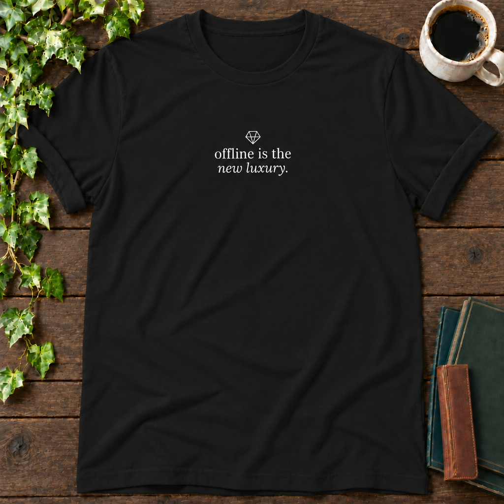 offline is the new luxury. black t-shirt flat lay