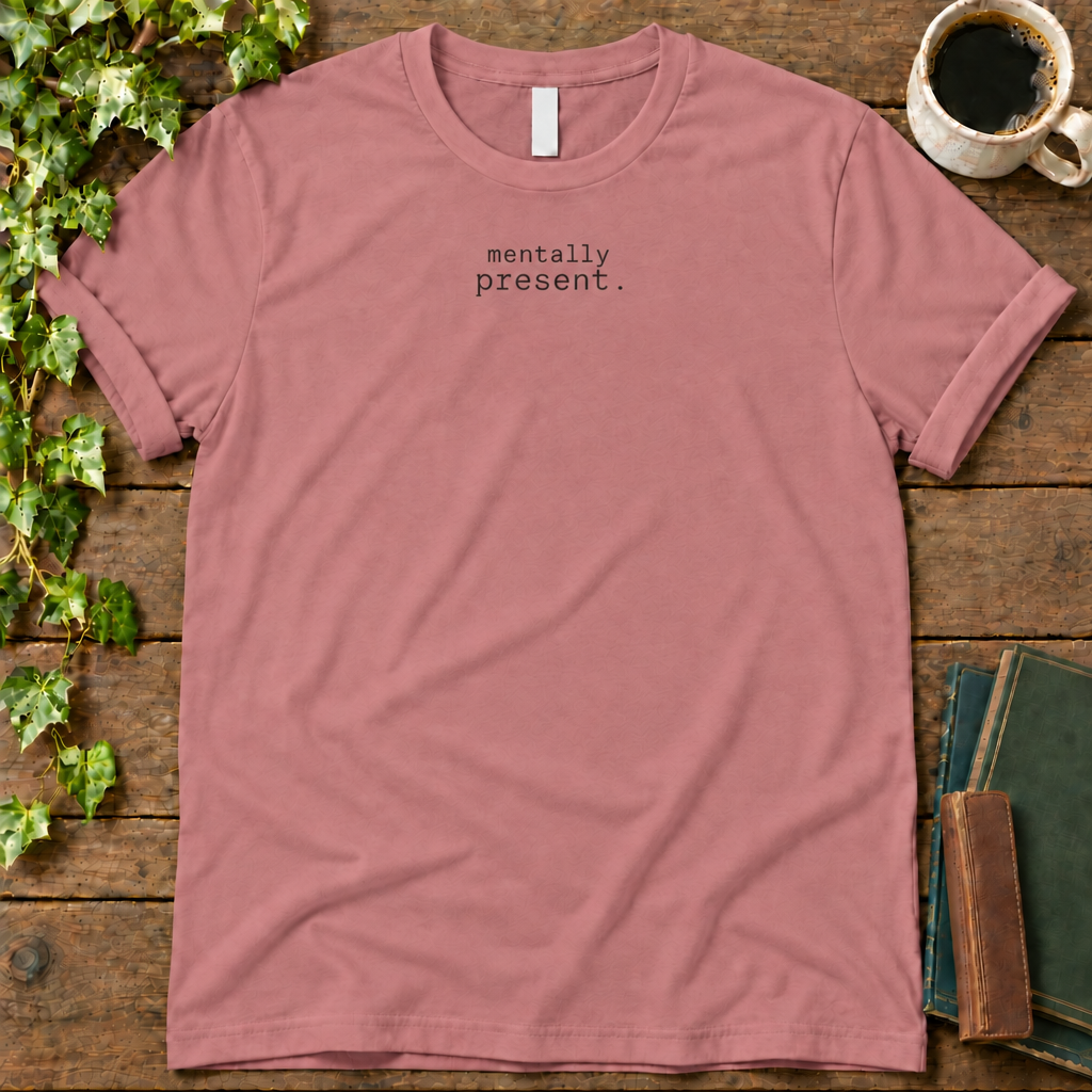 mentally present. mauve t-shirt flat lay