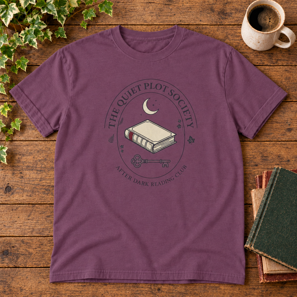 The Quiet Plot Society tee in Berry, flat lay with book and coffee