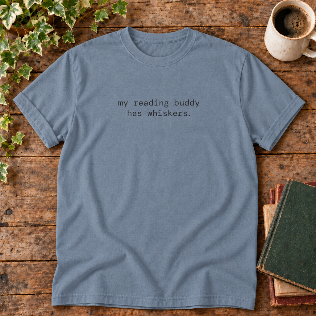 Blue Jean tee with my reading buddy has whiskers text in rustic flat lay