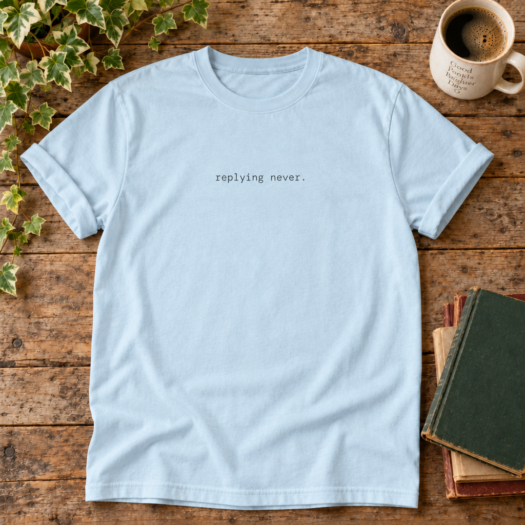 Replying never. Chambray t-shirt weathered-wood flat lay
