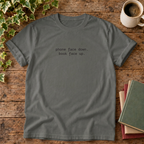 Phone face down T-shirt in Pepper, stylised flat lay with blank neckline