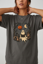 Close-up of woman wearing the Pepper graveyard reader t-shirt