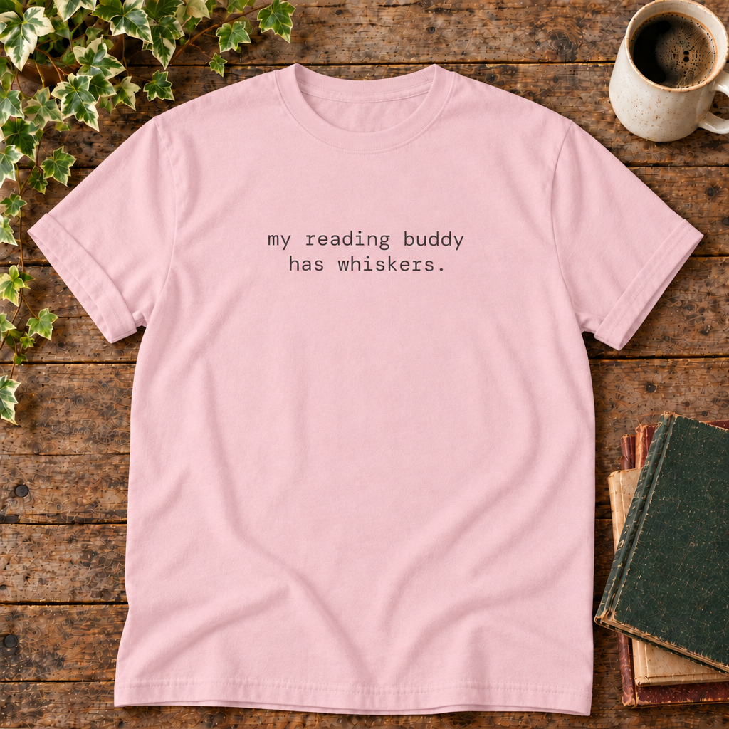 Blossom tee with my reading buddy has whiskers text in rustic flat lay
