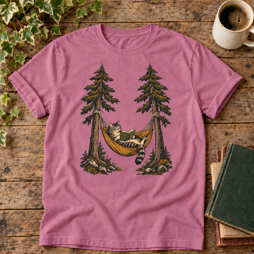 Cat reading in a hammock on Berry tee
