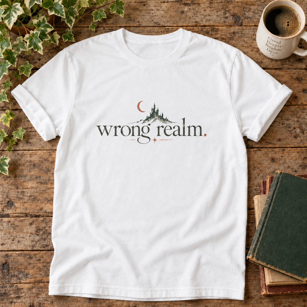 Wrong realm. White t-shirt castle and crescent moon flat lay