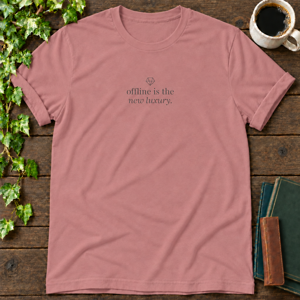 offline is the new luxury. mauve t-shirt flat lay