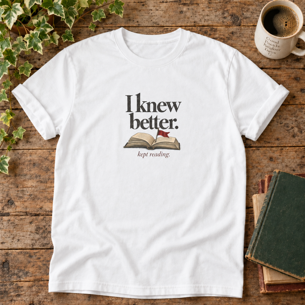 I knew better. Kept reading. White book lover t-shirt flat lay