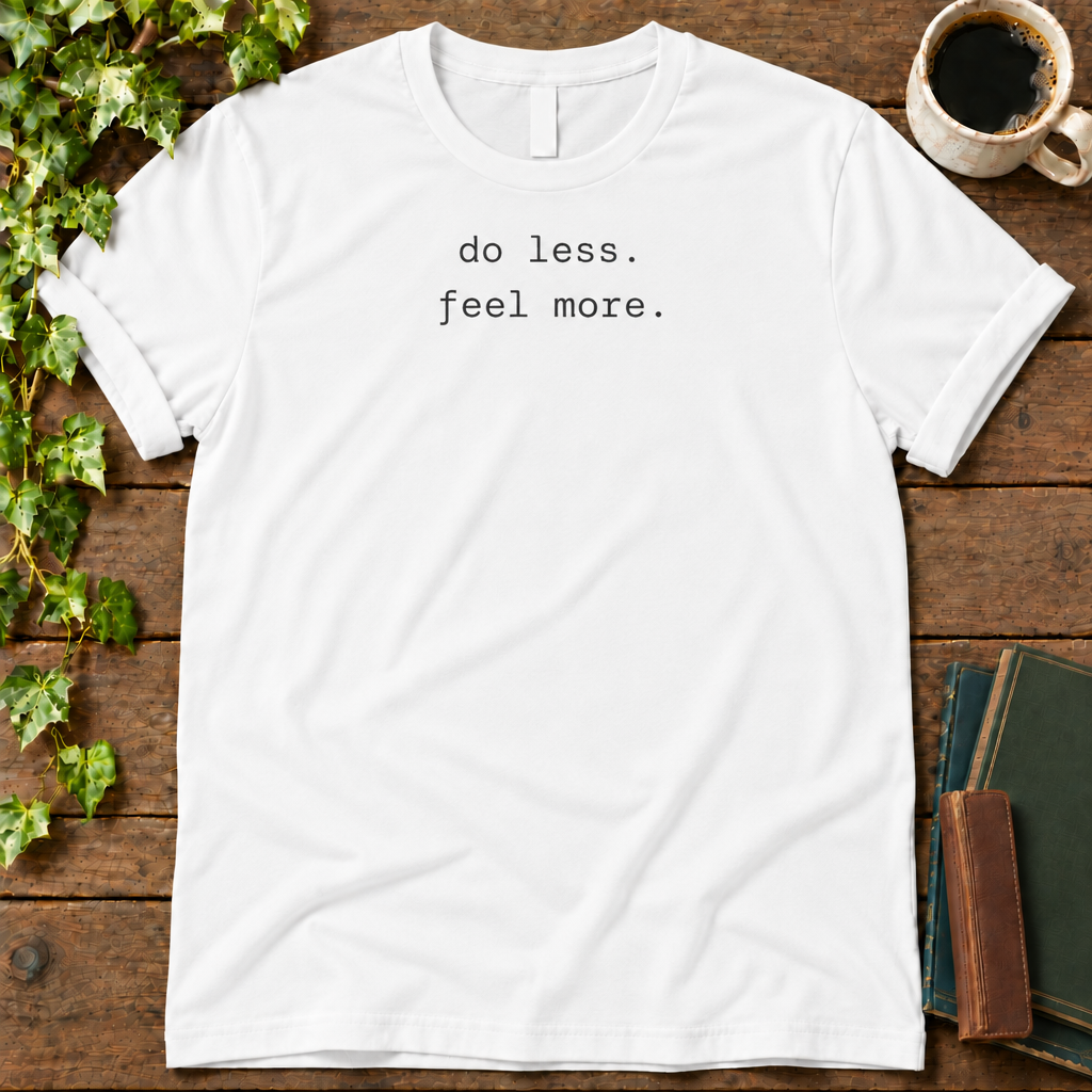 do less. feel more. white t-shirt flat lay