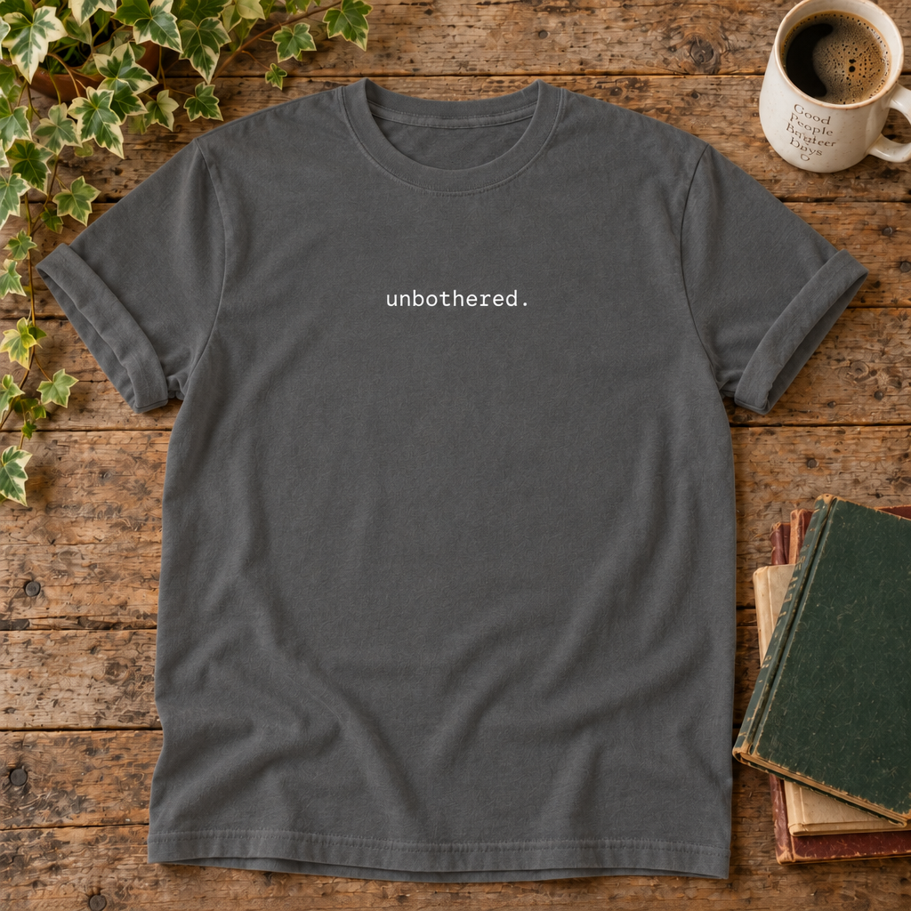 Unbothered. Pepper t-shirt weathered-wood flat lay