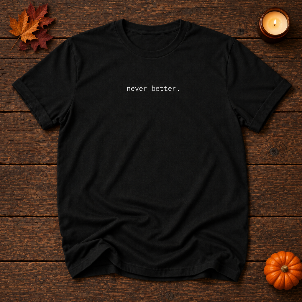 never better. black tee, minimal Halloween flat lay